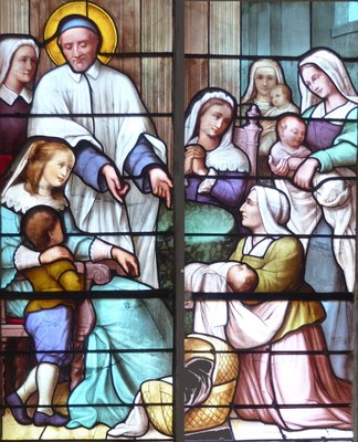 Saint Vincent de Paul accueille les nouveau-nés et les enfants.jpg
